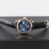 The 18k rose gold copy watches have black leather straps.